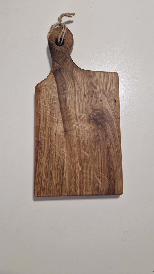 Handmade charcuterie board, perfect for serving cheese, featuring a durable and foodsafe handcrafted design.