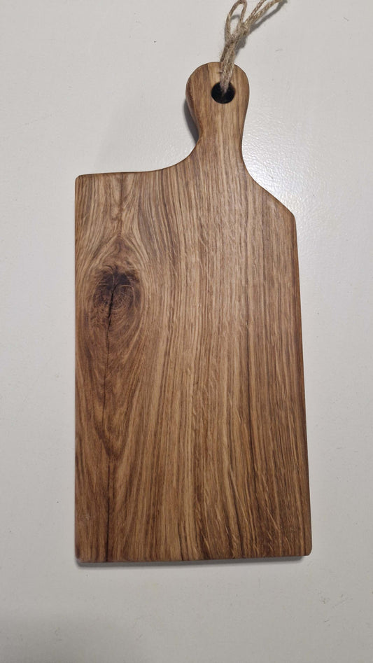 Handmade oak charcuterie board, medium size, with natural wood grain.