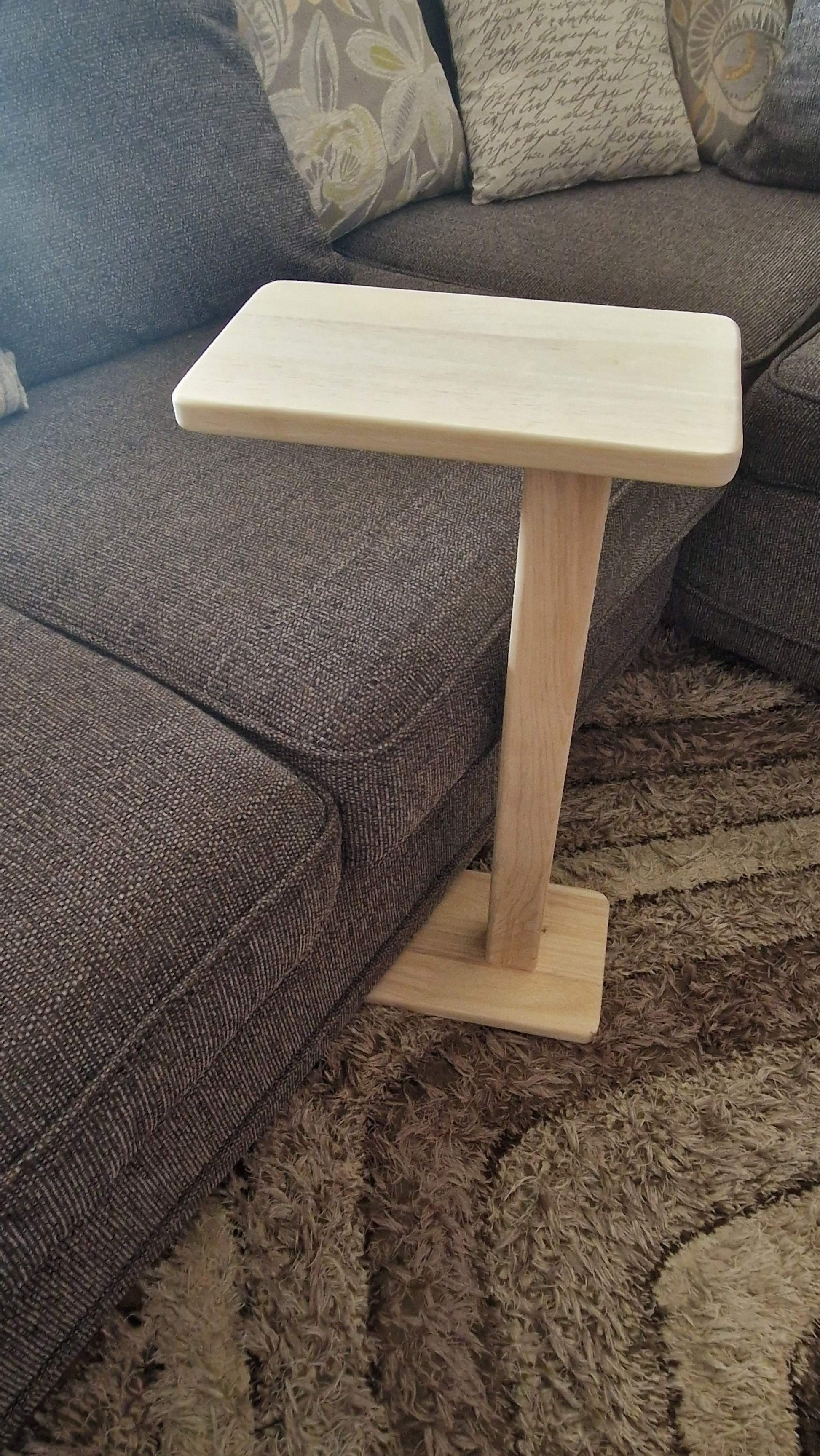 Handmade oak wooden couch table with sleek C-shape design and epoxy details.