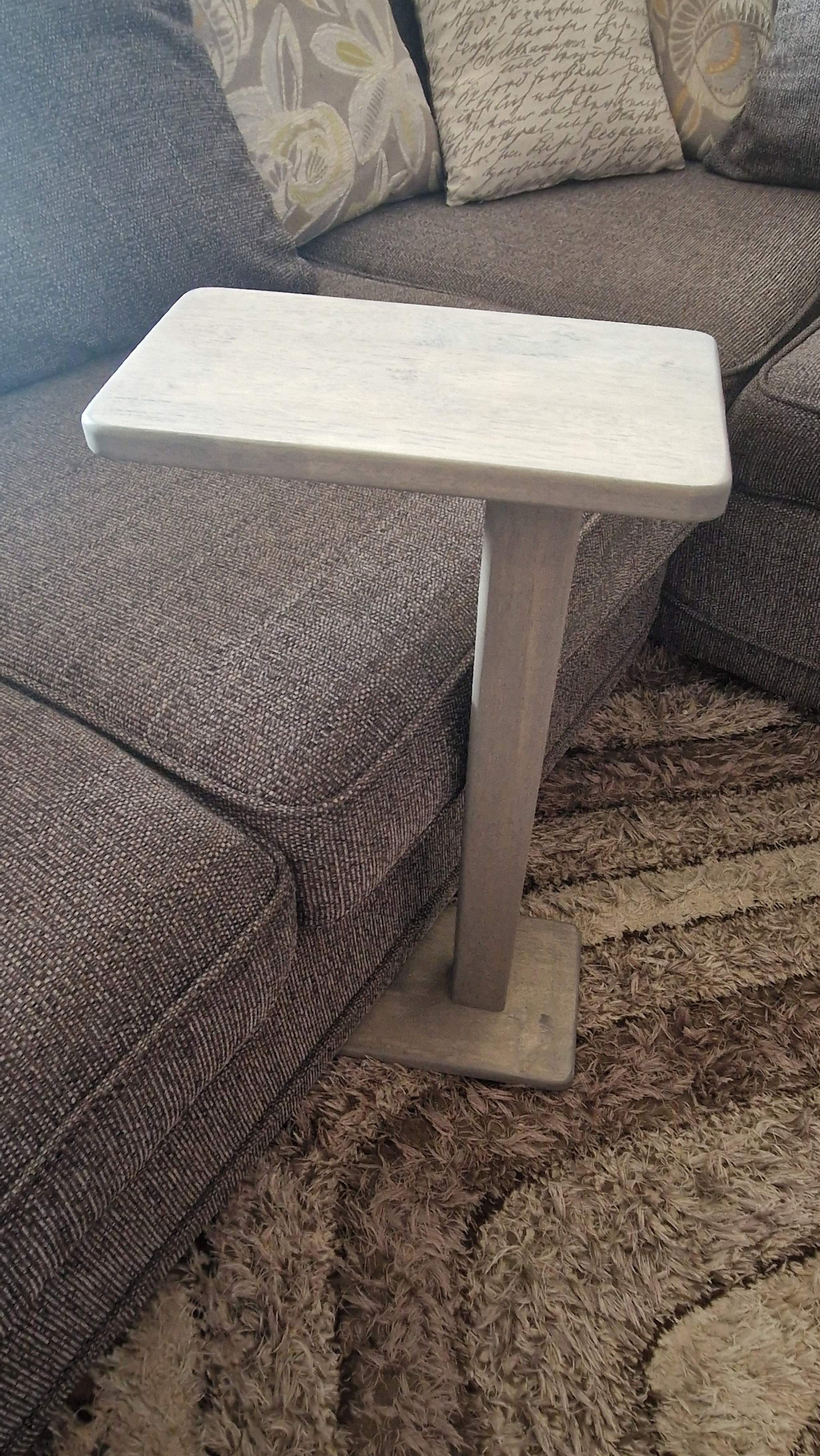Handmade oak wooden couch table with sleek C-shape design, perfect as a side table or laptop stand.