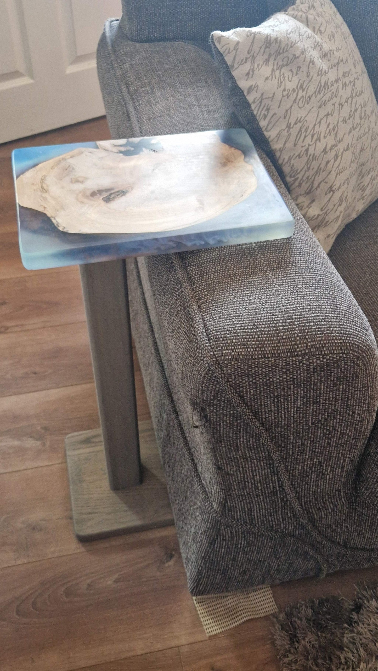 Handmade oak wooden couch table with epoxy finish, featuring a durable and elegant design for versatile use.