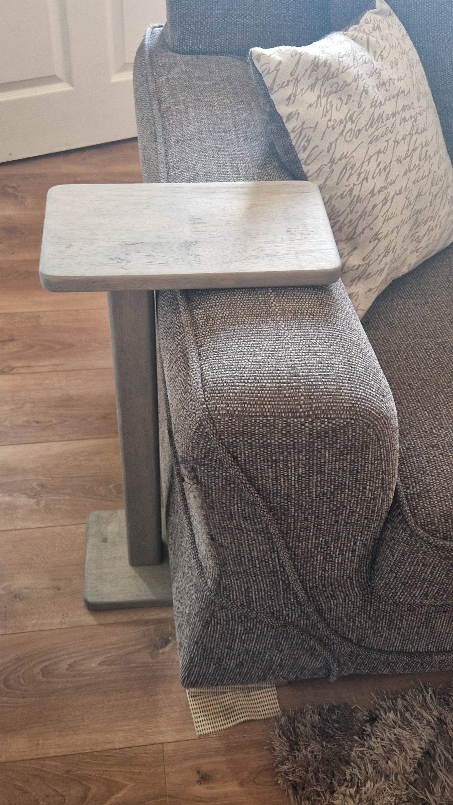 Handmade oak wooden couch table in grey, featuring a sleek C-shape design for versatile use.