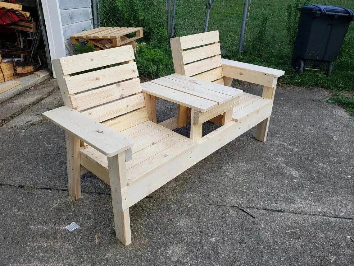 Jack and Jill Garden Bench on patio; two connected seats with central table.