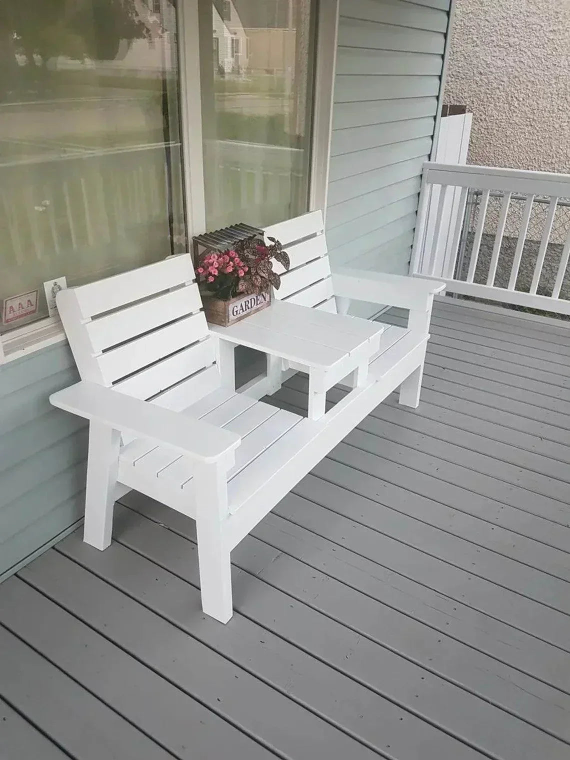Jack and Jill Garden Bench on patio; two connected seats with central table.